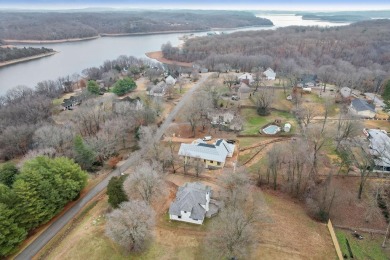 Welcome home to this beautiful Rogers Lake home with a community on Prairie Creek Country Club in Arkansas - for sale on GolfHomes.com, golf home, golf lot