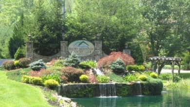 Charming wooded lot in the prestigious Smoky Mountain Country on Smoky Mountain Country Club in North Carolina - for sale on GolfHomes.com, golf home, golf lot