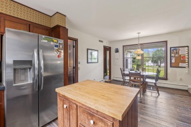 Located at the end of Belgrade Lakes Village, 14 Lakeshore Drive on Belgrade Lakes Golf Club in Maine - for sale on GolfHomes.com, golf home, golf lot