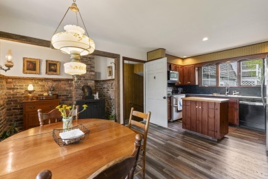 Located at the end of Belgrade Lakes Village, 14 Lakeshore Drive on Belgrade Lakes Golf Club in Maine - for sale on GolfHomes.com, golf home, golf lot