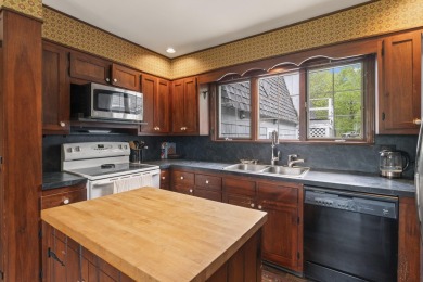 Located at the end of Belgrade Lakes Village, 14 Lakeshore Drive on Belgrade Lakes Golf Club in Maine - for sale on GolfHomes.com, golf home, golf lot
