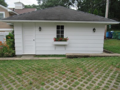 Enjoy the charm of one of the last Diamond lake cottages still on Diamond Lake Golf Club in Michigan - for sale on GolfHomes.com, golf home, golf lot