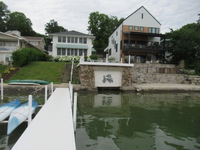 Enjoy the charm of one of the last Diamond lake cottages still on Diamond Lake Golf Club in Michigan - for sale on GolfHomes.com, golf home, golf lot