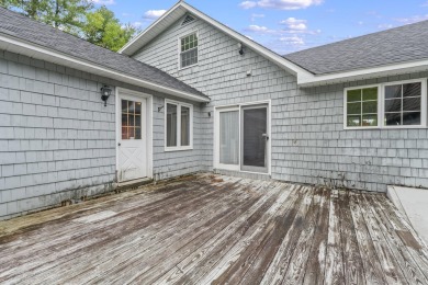 Located at the end of Belgrade Lakes Village, 14 Lakeshore Drive on Belgrade Lakes Golf Club in Maine - for sale on GolfHomes.com, golf home, golf lot