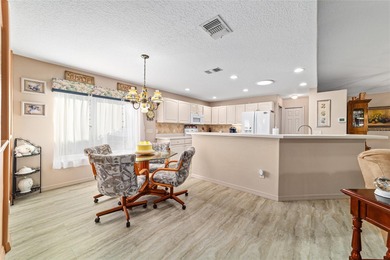 Located in SummerGlen, Ocala, this 2-bedroom, 2-bath home spans on Summerglen Country Club in Florida - for sale on GolfHomes.com, golf home, golf lot