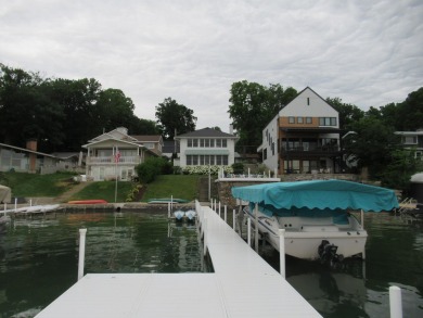 Enjoy the charm of one of the last Diamond lake cottages still on Diamond Lake Golf Club in Michigan - for sale on GolfHomes.com, golf home, golf lot