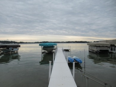 Enjoy the charm of one of the last Diamond lake cottages still on Diamond Lake Golf Club in Michigan - for sale on GolfHomes.com, golf home, golf lot