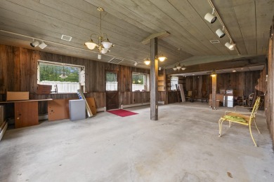 Located at the end of Belgrade Lakes Village, 14 Lakeshore Drive on Belgrade Lakes Golf Club in Maine - for sale on GolfHomes.com, golf home, golf lot