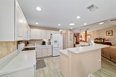 Located in SummerGlen, Ocala, this 2-bedroom, 2-bath home spans on Summerglen Country Club in Florida - for sale on GolfHomes.com, golf home, golf lot