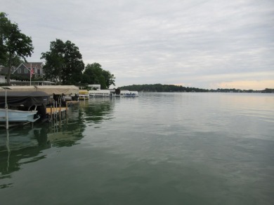 Enjoy the charm of one of the last Diamond lake cottages still on Diamond Lake Golf Club in Michigan - for sale on GolfHomes.com, golf home, golf lot