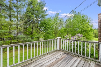 Located at the end of Belgrade Lakes Village, 14 Lakeshore Drive on Belgrade Lakes Golf Club in Maine - for sale on GolfHomes.com, golf home, golf lot