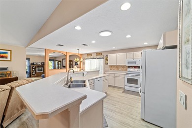 Located in SummerGlen, Ocala, this 2-bedroom, 2-bath home spans on Summerglen Country Club in Florida - for sale on GolfHomes.com, golf home, golf lot