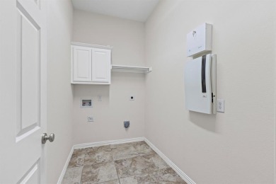 This home makes an unforgettable first impression! The classic on Firewheel Golf Park in Texas - for sale on GolfHomes.com, golf home, golf lot