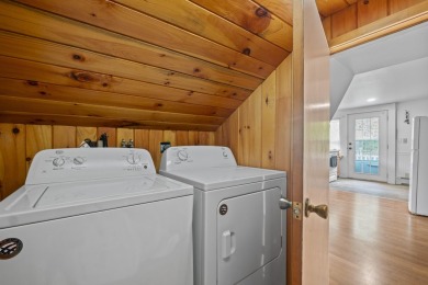 Located at the end of Belgrade Lakes Village, 14 Lakeshore Drive on Belgrade Lakes Golf Club in Maine - for sale on GolfHomes.com, golf home, golf lot