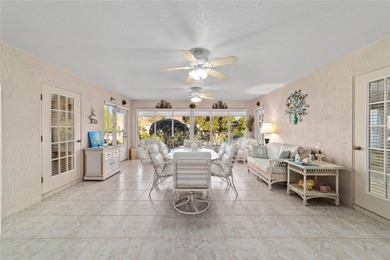 Located in SummerGlen, Ocala, this 2-bedroom, 2-bath home spans on Summerglen Country Club in Florida - for sale on GolfHomes.com, golf home, golf lot