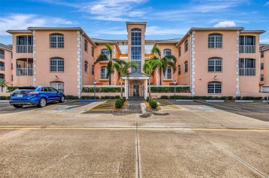 Appealing two bedroom, plus den, two bath condo with a two car on Capri Isle Golf Club in Florida - for sale on GolfHomes.com, golf home, golf lot