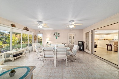 Located in SummerGlen, Ocala, this 2-bedroom, 2-bath home spans on Summerglen Country Club in Florida - for sale on GolfHomes.com, golf home, golf lot