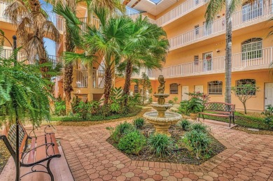 Appealing two bedroom, plus den, two bath condo with a two car on Capri Isle Golf Club in Florida - for sale on GolfHomes.com, golf home, golf lot