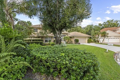 Nestled on a serene culdesac, this beautifully updated home on St. Lucie Trail Golf Club in Florida - for sale on GolfHomes.com, golf home, golf lot