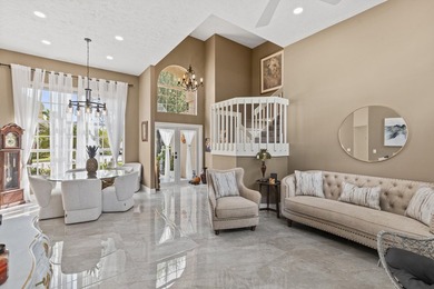 Nestled on a serene culdesac, this beautifully updated home on St. Lucie Trail Golf Club in Florida - for sale on GolfHomes.com, golf home, golf lot