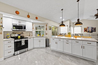 Nestled on a serene culdesac, this beautifully updated home on St. Lucie Trail Golf Club in Florida - for sale on GolfHomes.com, golf home, golf lot