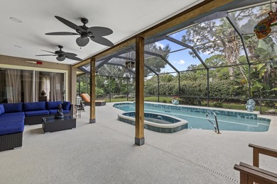Nestled on a serene culdesac, this beautifully updated home on St. Lucie Trail Golf Club in Florida - for sale on GolfHomes.com, golf home, golf lot