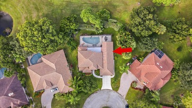 Nestled on a serene culdesac, this beautifully updated home on St. Lucie Trail Golf Club in Florida - for sale on GolfHomes.com, golf home, golf lot