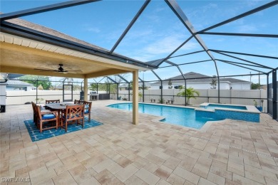 Tropical Pool & Spa Home that feels Like a Vacation Every Day! on Del Tura Golf and Country Club in Florida - for sale on GolfHomes.com, golf home, golf lot