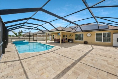 Tropical Pool & Spa Home that feels Like a Vacation Every Day! on Del Tura Golf and Country Club in Florida - for sale on GolfHomes.com, golf home, golf lot