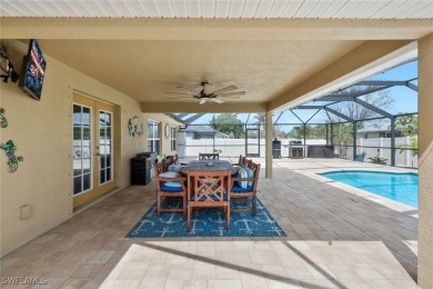 Tropical Pool & Spa Home that feels Like a Vacation Every Day! on Del Tura Golf and Country Club in Florida - for sale on GolfHomes.com, golf home, golf lot