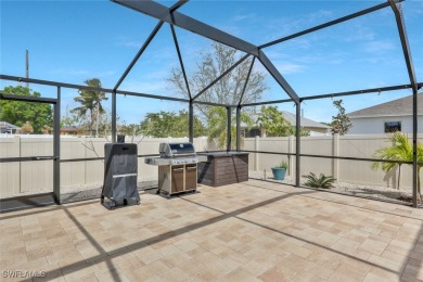 Tropical Pool & Spa Home that feels Like a Vacation Every Day! on Del Tura Golf and Country Club in Florida - for sale on GolfHomes.com, golf home, golf lot