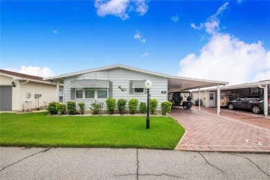 Welcome to effortless living in this charming 2-bedroom, 2-bath on Sweetwater Golf and Tennis Club in Florida - for sale on GolfHomes.com, golf home, golf lot