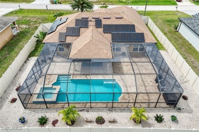 Tropical Pool & Spa Home that feels Like a Vacation Every Day! on Del Tura Golf and Country Club in Florida - for sale on GolfHomes.com, golf home, golf lot