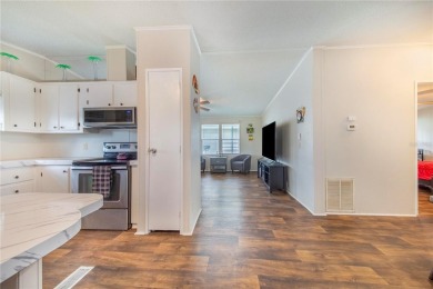 Welcome to effortless living in this charming 2-bedroom, 2-bath on Sweetwater Golf and Tennis Club in Florida - for sale on GolfHomes.com, golf home, golf lot