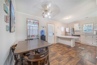 Welcome to effortless living in this charming 2-bedroom, 2-bath on Sweetwater Golf and Tennis Club in Florida - for sale on GolfHomes.com, golf home, golf lot