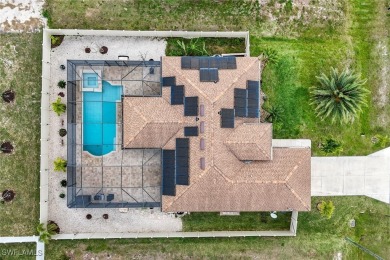 Tropical Pool & Spa Home that feels Like a Vacation Every Day! on Del Tura Golf and Country Club in Florida - for sale on GolfHomes.com, golf home, golf lot