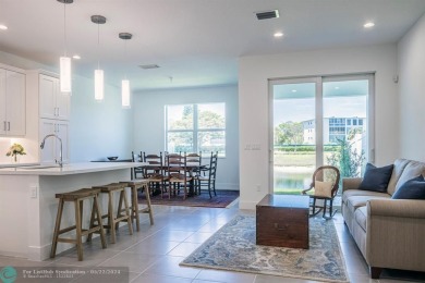 This new construction townhouse at Sandpiper Pointe has all the on Hillsboro Pines Golf in Florida - for sale on GolfHomes.com, golf home, golf lot