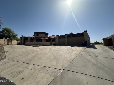 Investor special with incredible lake, mountain, and golf course on London Bridge Golf Course in Arizona - for sale on GolfHomes.com, golf home, golf lot