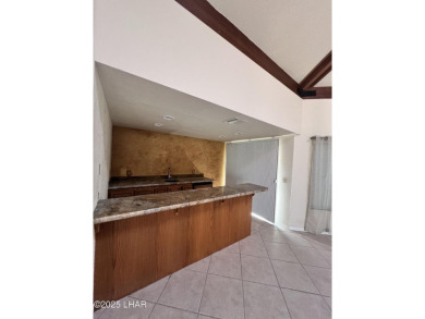 Investor special with incredible lake, mountain, and golf course on London Bridge Golf Course in Arizona - for sale on GolfHomes.com, golf home, golf lot