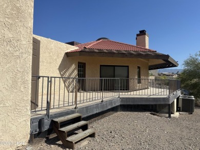 Investor special with incredible lake, mountain, and golf course on London Bridge Golf Course in Arizona - for sale on GolfHomes.com, golf home, golf lot