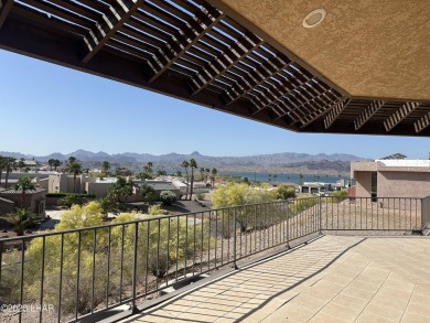 Investor special with incredible lake, mountain, and golf course on London Bridge Golf Course in Arizona - for sale on GolfHomes.com, golf home, golf lot