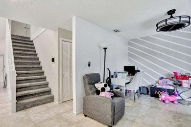 Turnkey + income-producing in sought-after Woodmont . This 3BD/2 on Woodmont Country Club in Florida - for sale on GolfHomes.com, golf home, golf lot