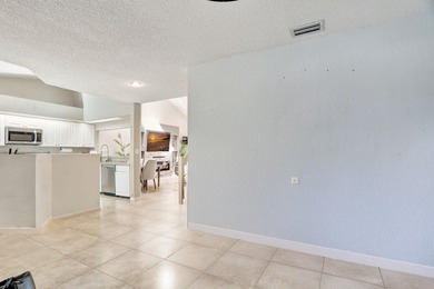 Turnkey + income-producing in sought-after Woodmont . This 3BD/2 on Woodmont Country Club in Florida - for sale on GolfHomes.com, golf home, golf lot