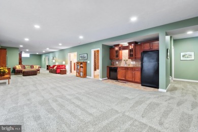 This beautiful main level living home is tucked back on a quiet on Fawn Lake Country Club in Virginia - for sale on GolfHomes.com, golf home, golf lot