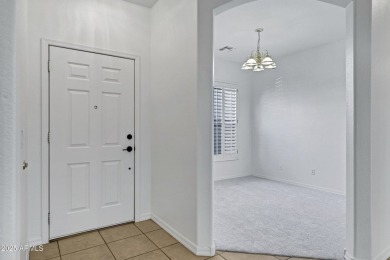 Refreshed 2-bedroom, 2-bathroom home with versatile den on Lone Tree Golf Club in Arizona - for sale on GolfHomes.com, golf home, golf lot