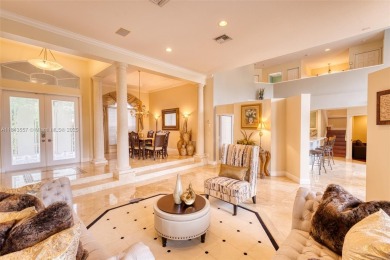 SPECTACULAR WATER VIEWS FROM 5 BED, 4 FULL BATH, POOL WITH on Heron Bay Golf Club in Florida - for sale on GolfHomes.com, golf home, golf lot