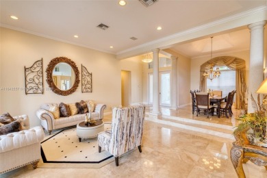 SPECTACULAR WATER VIEWS FROM 5 BED, 4 FULL BATH, POOL WITH on Heron Bay Golf Club in Florida - for sale on GolfHomes.com, golf home, golf lot