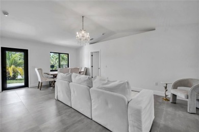 NEVER FLOODED! WOW-FACTOR WATERFRONT! Whole house luxury on Rotonda Golf and Country Club - Long Marsh  in Florida - for sale on GolfHomes.com, golf home, golf lot