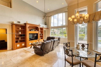 SPECTACULAR WATER VIEWS FROM 5 BED, 4 FULL BATH, POOL WITH on Heron Bay Golf Club in Florida - for sale on GolfHomes.com, golf home, golf lot