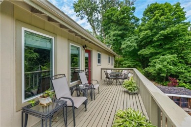 Enjoy stunning views of the Ozarks for miles from the back deck on Holiday Island Golf Course in Arkansas - for sale on GolfHomes.com, golf home, golf lot